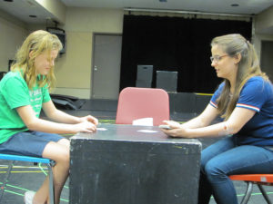 Guest actor Mae Johnston, 12, in the role of 7-year-old Josie, and SFA theatre student Maggie Strain, in the role of Mrs. Kilbride, rehearse a scene from Marina Carr's "By the Bog of Cats." The SFA School of Theatre's production of the Irish play runs Nov. 15 through 16 at 7:30 nightly in W.M. Turner Auditorium.