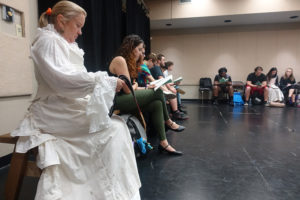 Retha Powers, in foreground, senior theatre major from Nacogdoches, wears a special rehearsal skirt and corset created for her to wear in preparation for the elaborate costume she will wear as Madame Pernelle in the School of Theatre's production of Molière's "Tartuffe."