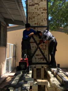 Students at La Universidad Autonoma de Chihuahua in Mexico work to construct the first wood fire kiln in Northern Mexico. The project was another of SFA Professor of Ceramics Piero Fenci's artistic collaborations with the university.