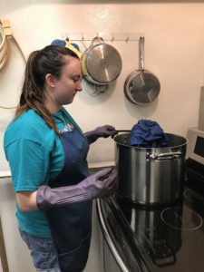  Chandler senior theater major Jessica Griffin dyes fabric for one of the costumes she designed for "The Post Office," one of "Three One-Acts Plays by Asian Authors" the School of Theatre will present Feb. 26 through March 2 in Turner Auditorium of the SFA campus.
