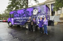 Stephen F. Austin State University’s new mobile food lab, the Lumberjack Express, will begin service Feb. 26. Tickets will be available for purchase online starting Tuesday, Feb. 12. Hospitality administration faculty members Todd Barrios, chef; Dr. Chay Runnels, program coordinator and associate professor; Dr. Mary Olle, assistant professor; and Donna Fickes, clinical instructor, are pictured alongside the mobile food lab. 