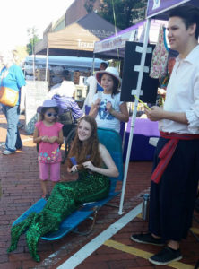 SFA theatre students Aubrey Moore and Connor Morrison, as characters from "The Little Mermaid," greet children at the 2017 Texas Blueberry Festival.