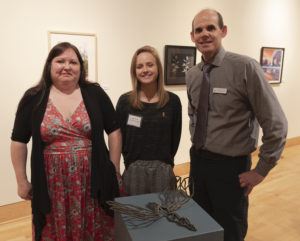 SFA senior sculpture student Allison Silcox of Winnie, center, has been selected by the SFA Friends of the Visual Arts to receive this year's Gary Q. Frields Art Scholarship. Pictured with her are FVA President Crystal Hicks and School of Art Director Christopher Talbot.