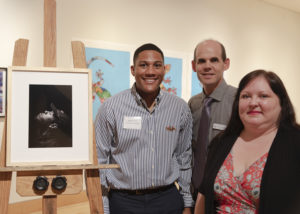 Duncanville junior art student Cameron Sweet, left, is this year's Robert Kinsell Art Scholarship recipient at SFA. Pictured with him are School of Art Director Christopher Talbot and FVA President Crystal Hicks.