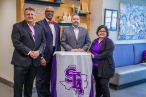 Stephen F. Austin State University named Rockwall and Rockwall-Heath high schools as partner schools in the university's Distinguished High School Program. Pictured, from left, are Dr. Kelvin Stroy, Rockwall ISD chief student services officer; Dr. John Villarreal, Rockwall ISD superintendent; SFA President Dr. Scott Gordon; and Erma Nieto Brecht, SFA executive director of enrollment management.