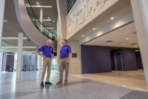 Dr. Gary Wurtz, right, dean of Stephen F. Austin State University's Micky Elliott College of Fine Arts, and Bill Elliott, fine arts and SFA benefactor, admire the beautiful interior of the newly renovated and expanded Griffith Fine Arts Building to be showcased during grand reopening and ribbon-cutting ceremonies at 1:30 p.m. Sept. 17. A Centennial Concert at 4 p.m. will be the first performance in the refreshed Turner Auditorium.